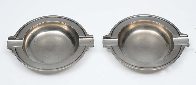 Appraisal: A PAIR OF TIFFANY CO STERLING SILVER ASHTRAYS model No