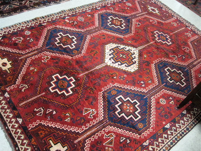 Appraisal: PERSIAN TRIBAL SHIRAZ CARPET Fars Province south central Iran repeating