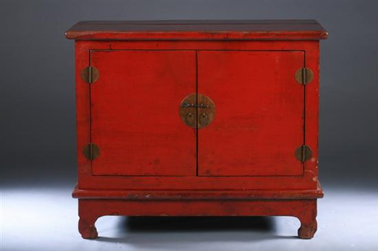 Appraisal: CHINESE RED LACQUERED ELM WOOD CABINET AND STAND mid Qing