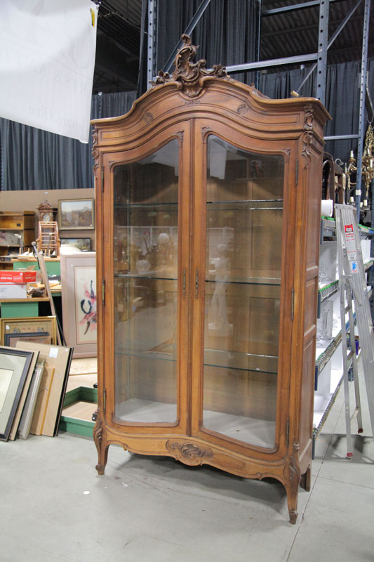 Appraisal: BREAKDOWN DISPLAY CUPBOARD Walnut having an arched and carved top