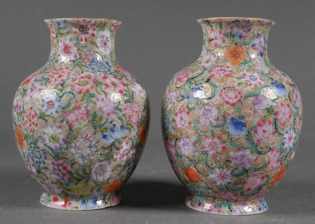 Appraisal: Pair of Chinese Famille Rose vases covered with a floral