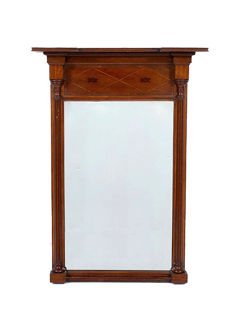 Appraisal: A GEORGIAN STYLE MAHOGANY RECTANGULAR WALL MIRROR with fluted column