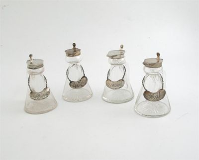 Appraisal: Four modern mounted glass whiskey tots with labels and star-cut