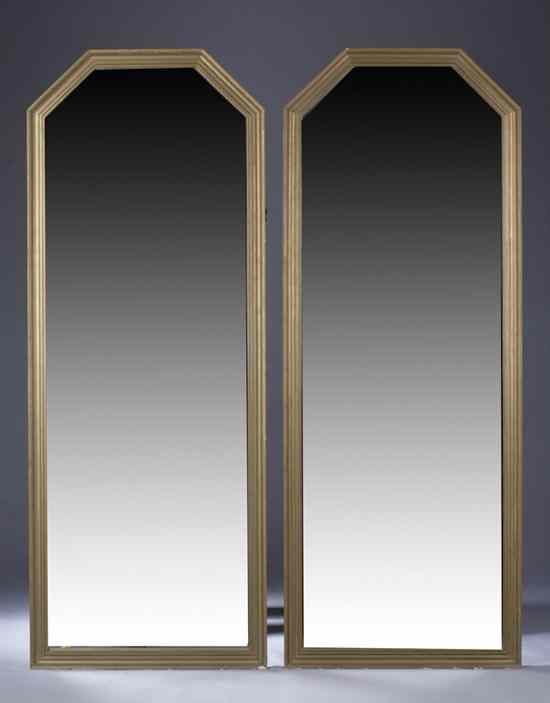 Appraisal: PAIR REGENCY STYLE GILT-PAINTED WALL MIRRORS Molded frame encompassing plate