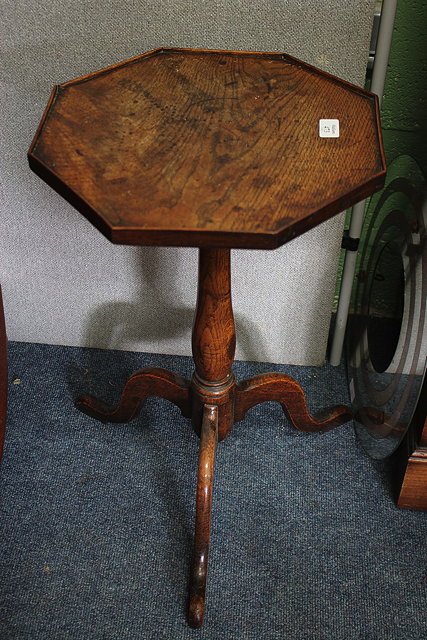 Appraisal: A GEORGE III OAK WINE TABLE with an octagonal top