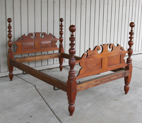 Appraisal: Cannonball rope bed with scalloped headboard and footboard chamfered panels