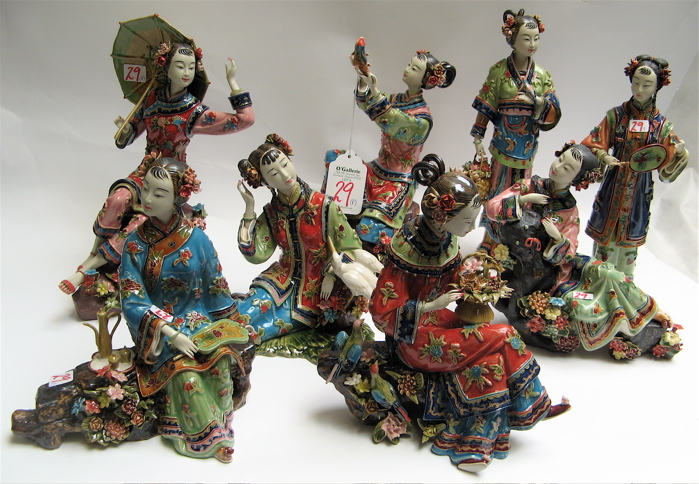 Appraisal: EIGHT CHINESE POTTERY BEAUTIFUL WOMEN SCULPTURES ornately dressed in traditional