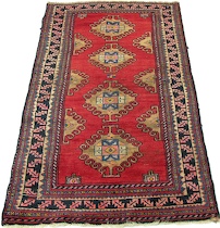 Appraisal: Antique Kazak Striking red ground woven with a hooked triple