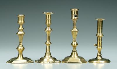 Appraisal: Four brass candlesticks scalloped circular and canted corner bases one