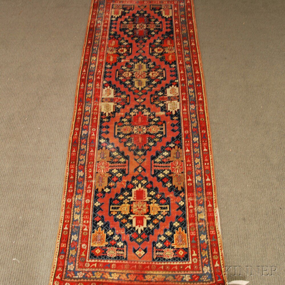 Appraisal: West Persian Long Rug th century dye runs wear reselvaged