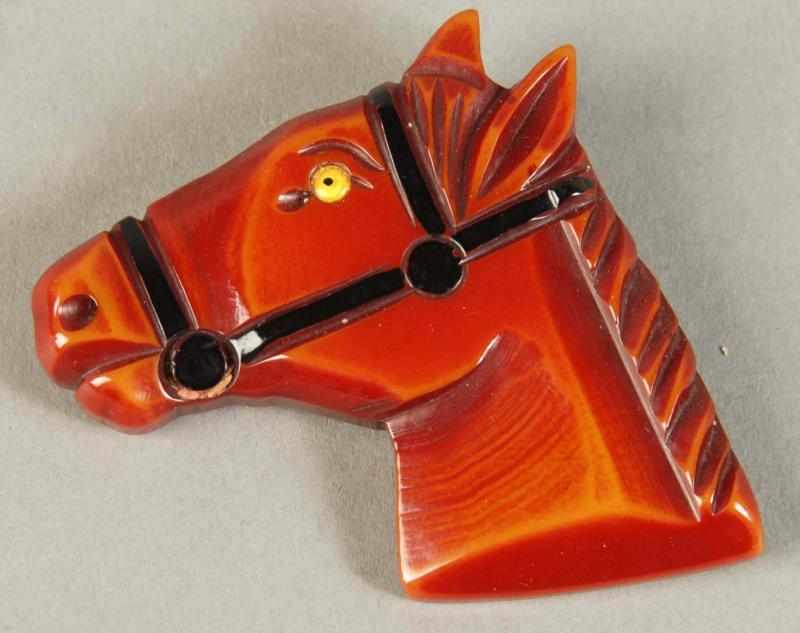 Appraisal: Carved Bakelite Horse Head Pin Condition Excellent Size L