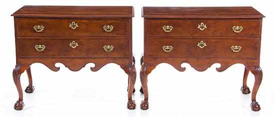 Appraisal: Pair George III style carved yew lowboys late th century