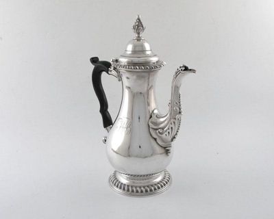 Appraisal: A George III silver coffee pot of baluster form scroll