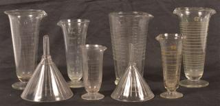 Appraisal: Eight Pharmacist Glass Beakers and Funnels Tallest h