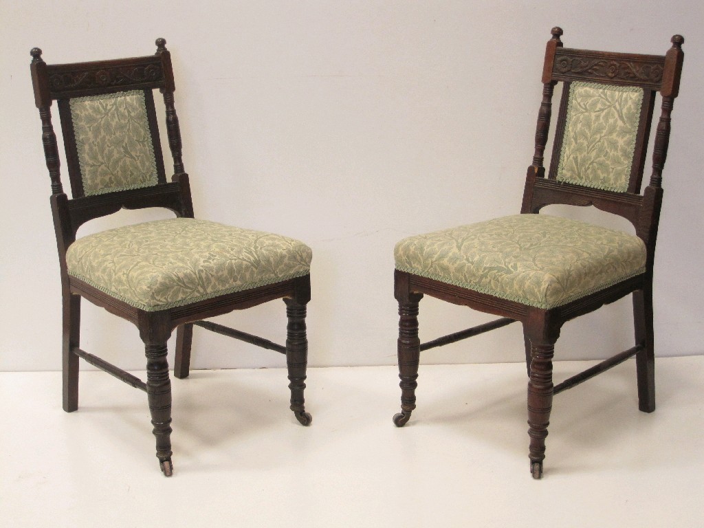 Appraisal: Four Victorian Single Chairs with carved frieze green patterned upholstery