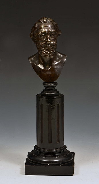 Appraisal: AN ITALIAN BRONZE MINIATURE PORTRAIT BUST of scholar on fluted