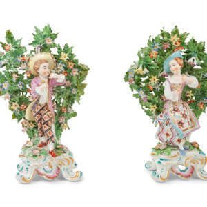 Appraisal: A Pair of Bow Porcelain Bocage Figurines with painted red