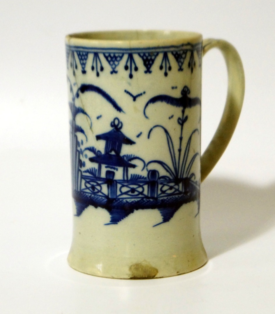 Appraisal: An thC Liverpool blue and white porcelain cider tankard the