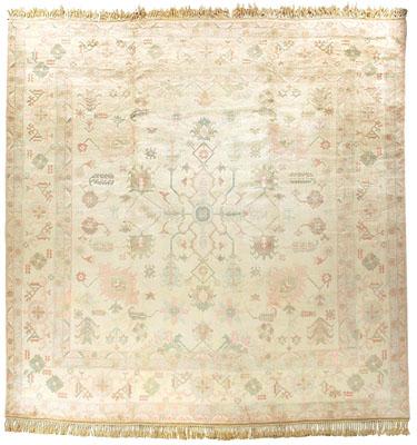 Appraisal: Modern Oushak style rug repeating floral and geometric designs on