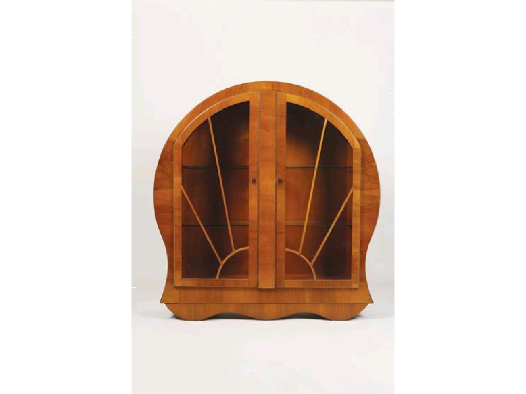 Appraisal: AN ART DECO WALNUT RADIO CABINET of shaped circular form