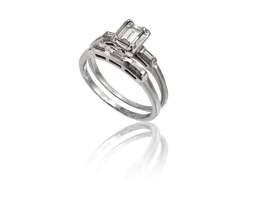 Appraisal: EMERALD CUT DIAMOND BRIDAL RING AND BAND K white gold