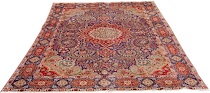 Appraisal: A Tabriz Carpet Ivory and red medallion over ink blue