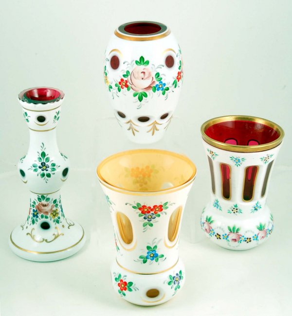 Appraisal: Four Bohemian white overlay vases One white over amber with