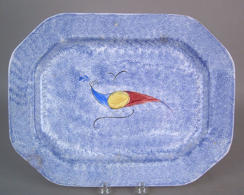 Appraisal: Blue spatter platter th c with peafowl decoration l w