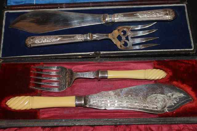 Appraisal: TWO SETS OF VICTORIAN FISH SERVERS one bone handled the