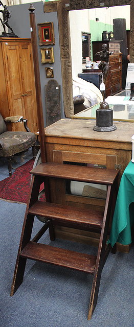 Appraisal: A SET OF MAHOGANY LIBRARY STEPS the vertical hand post