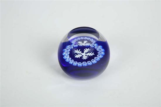 Appraisal: CAITHNESS PAPERWEIGHT A central white snowflake surrounded by blue and