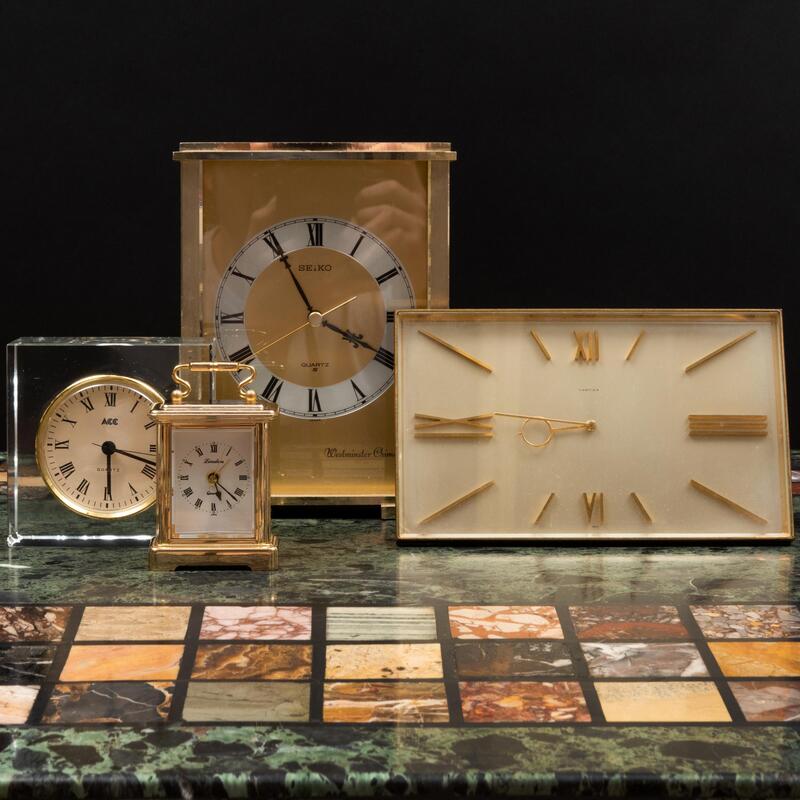 Appraisal: Group of Four Table Clocks Comprising A Cartier clockA Seiko