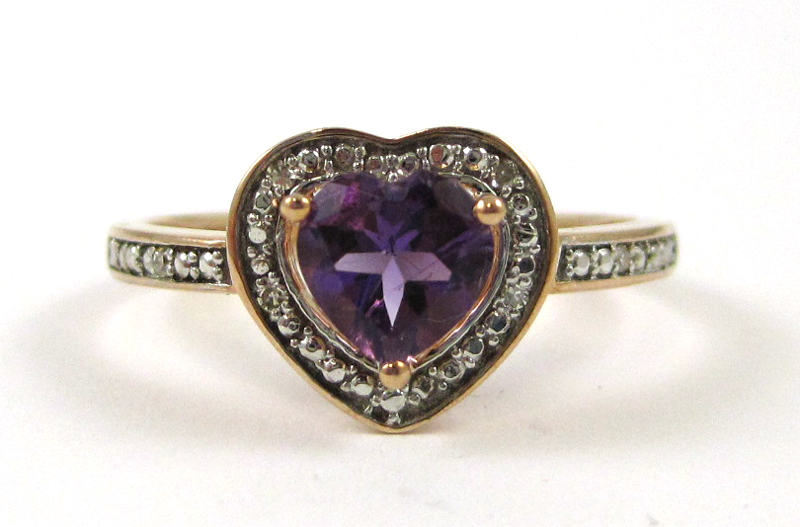 Appraisal: TEN KARAT ROSE GOLD AMETHYST AND DIAMOND RING round cut