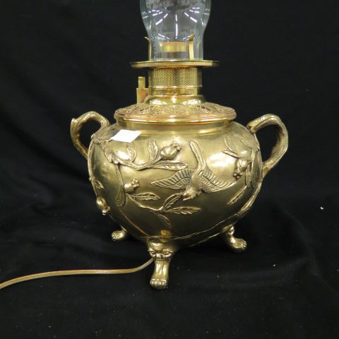 Appraisal: Oriental Brass Lamp birds foliage design tri-footed foo dog legs