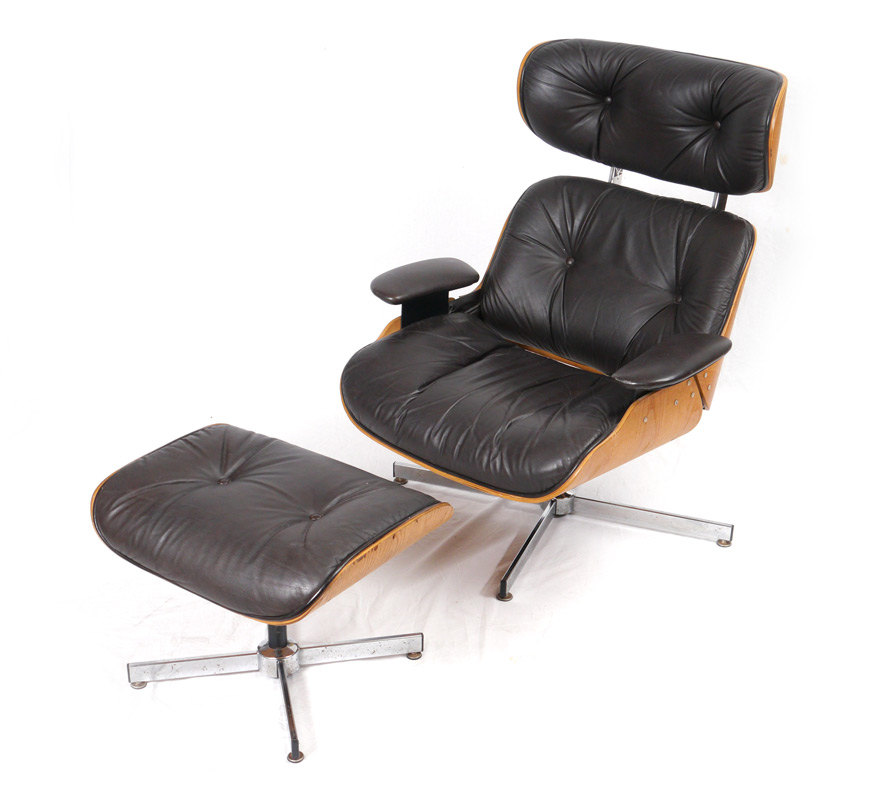 Appraisal: SELIG LOUNGE CHAIR OTTOMAN Eames style black leather and bent