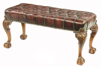 Appraisal: A rectangular stool in George II style the buttoned upholstered