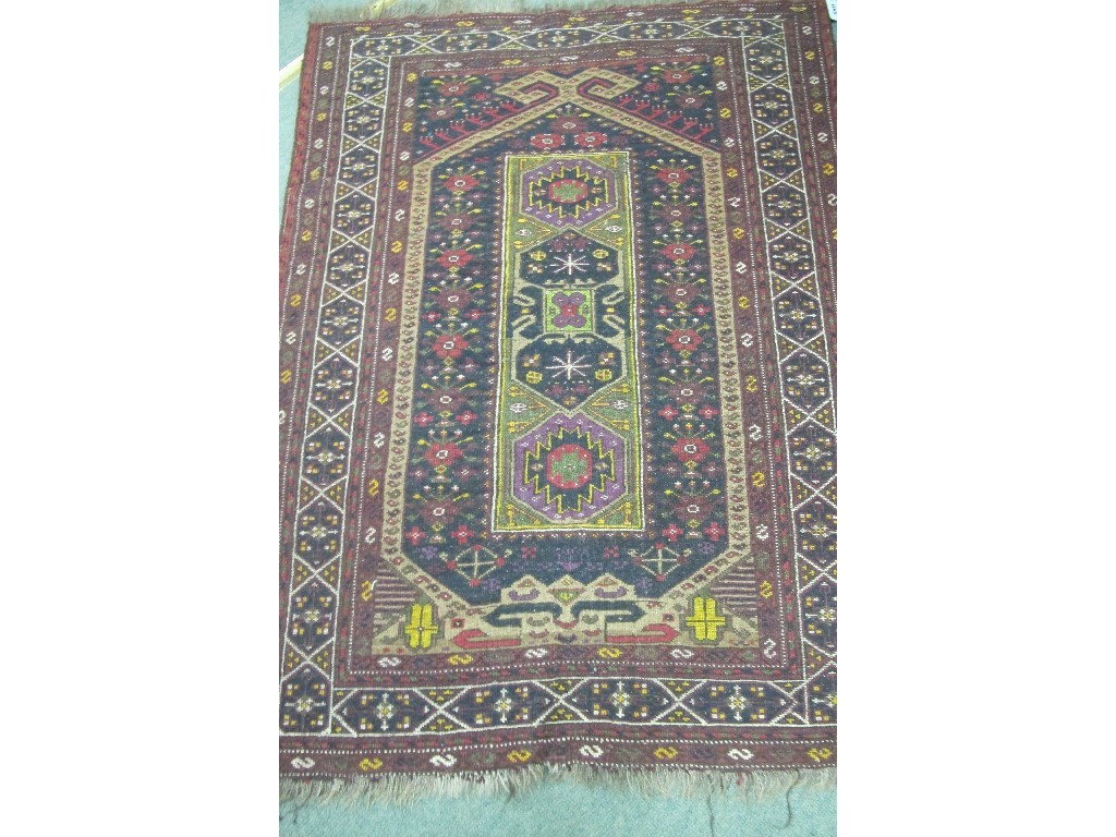 Appraisal: Two Persian multi coloured floor rugs