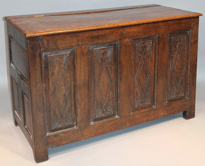 Appraisal: An thC oak coffer the rectangular lid hinging to reveal