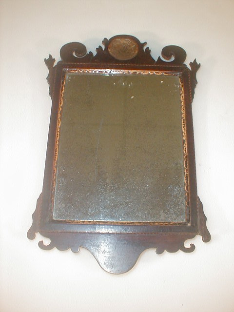 Appraisal: A small th century mahogany framed wall mirror with fret