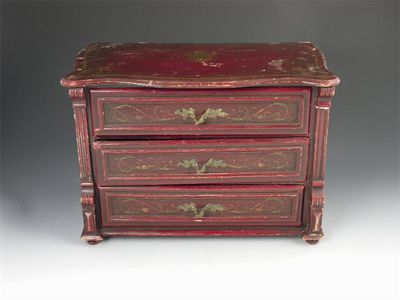 Appraisal: A continental miniature japanned three drawer commode with a serpentine