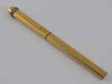 Appraisal: A gold plated ball point pen with retractable clip by