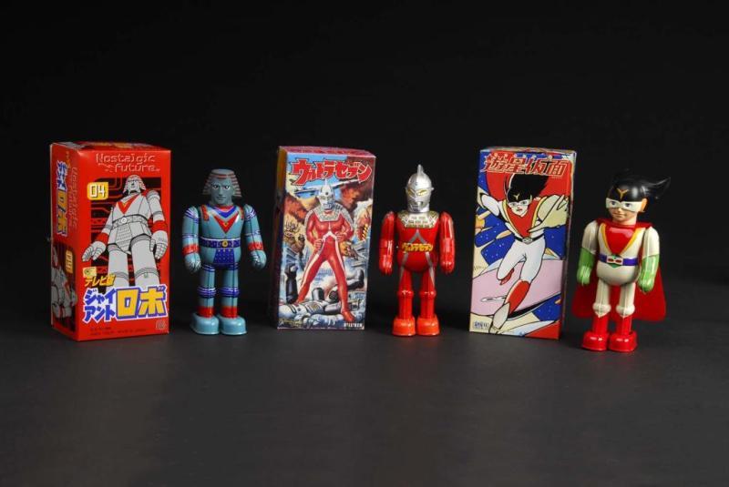 Appraisal: Lot of Tin Superhero Wind-Up Toys Description Japanese Includes Yusei