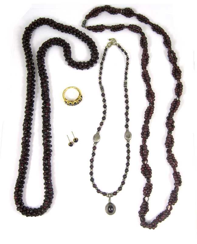 Appraisal: SIX ARTICLES OF GARNET JEWELRY including three beaded necklaces one