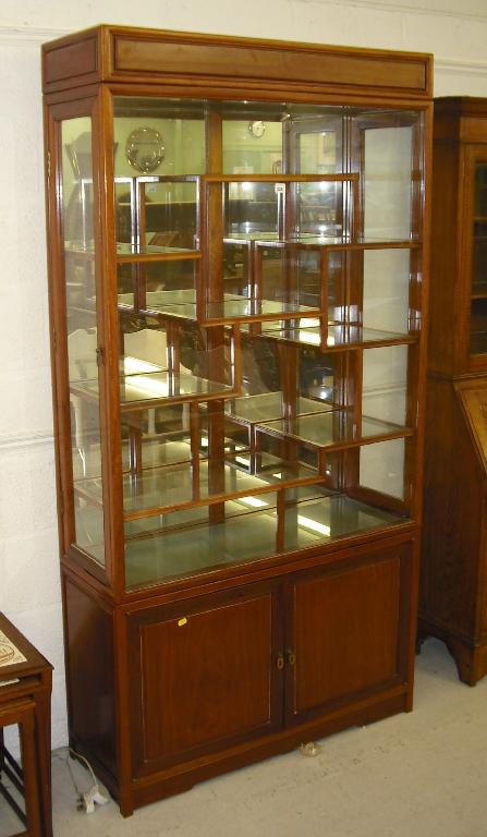 Appraisal: Good modern Chinese glazed display cabinet with side doors enclosing