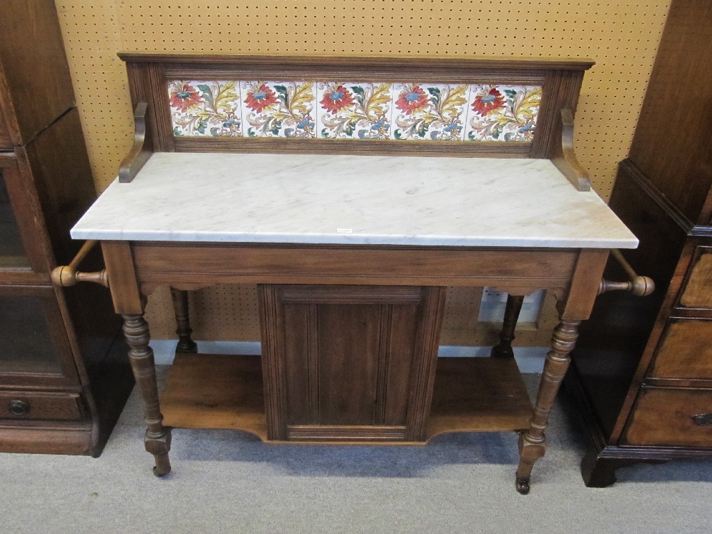 Appraisal: Mahogany washstand with tiled back and marble top