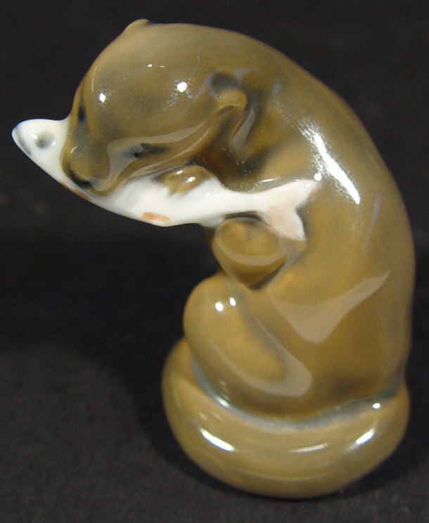 Appraisal: Royal Copenhagen porcelain otter with a fish in its mouth