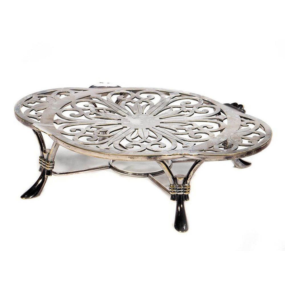 Appraisal: Christofle Silver Plate Trivet In the Rococo style on tapering