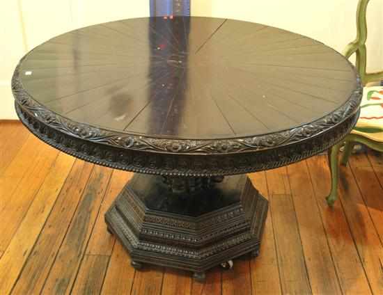 Appraisal: An Anglo-Ceylonese ebony centre table Circa The segmented circular top