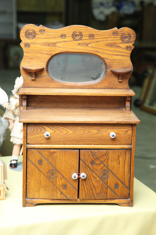 Appraisal: DOLL SIZE DRESSER Pine having an oval mirrored gallery over