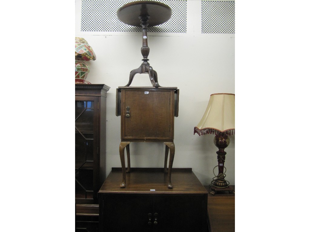 Appraisal: Mahogany cupboard chest bedside cabinet and wine table